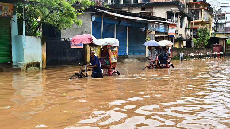 hindistanda sel ve heyelanlar 18 kisinin olumune yol acti e9pmsZxt